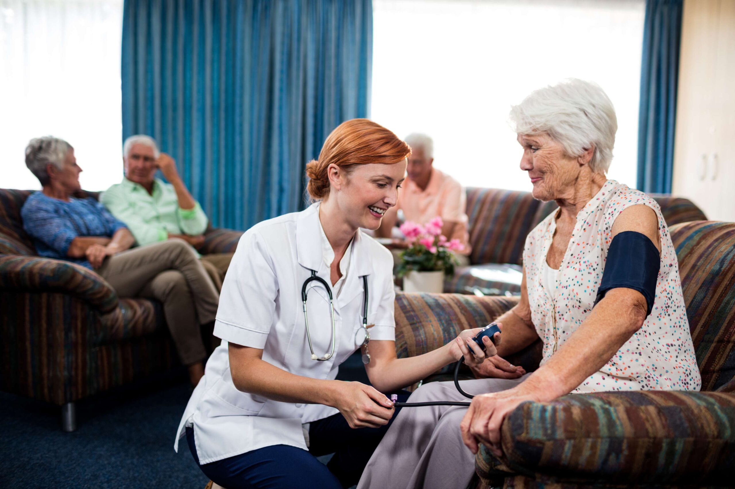 nurse-taking-care-of-pensioner-2021-08-28-18-33-05-utc